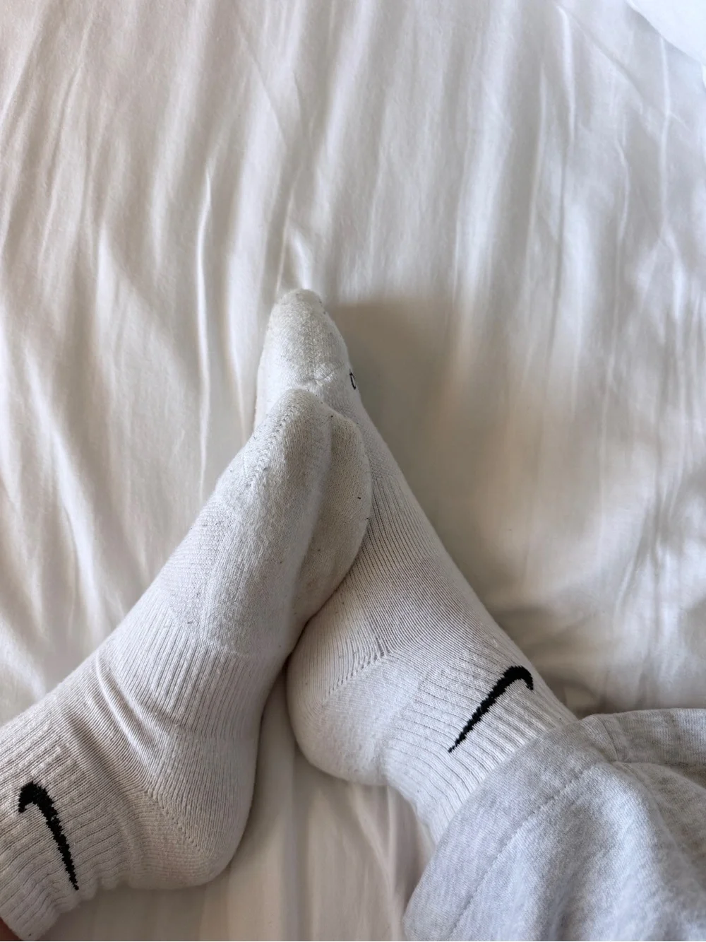 Nike White Athletic Dri-FIT Crew Socks with Black Swoosh
